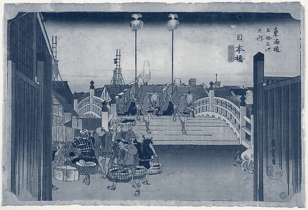 Hiroshige woodblock print of Nihonbashi bridge in Edo at dawn, merchants crossing
